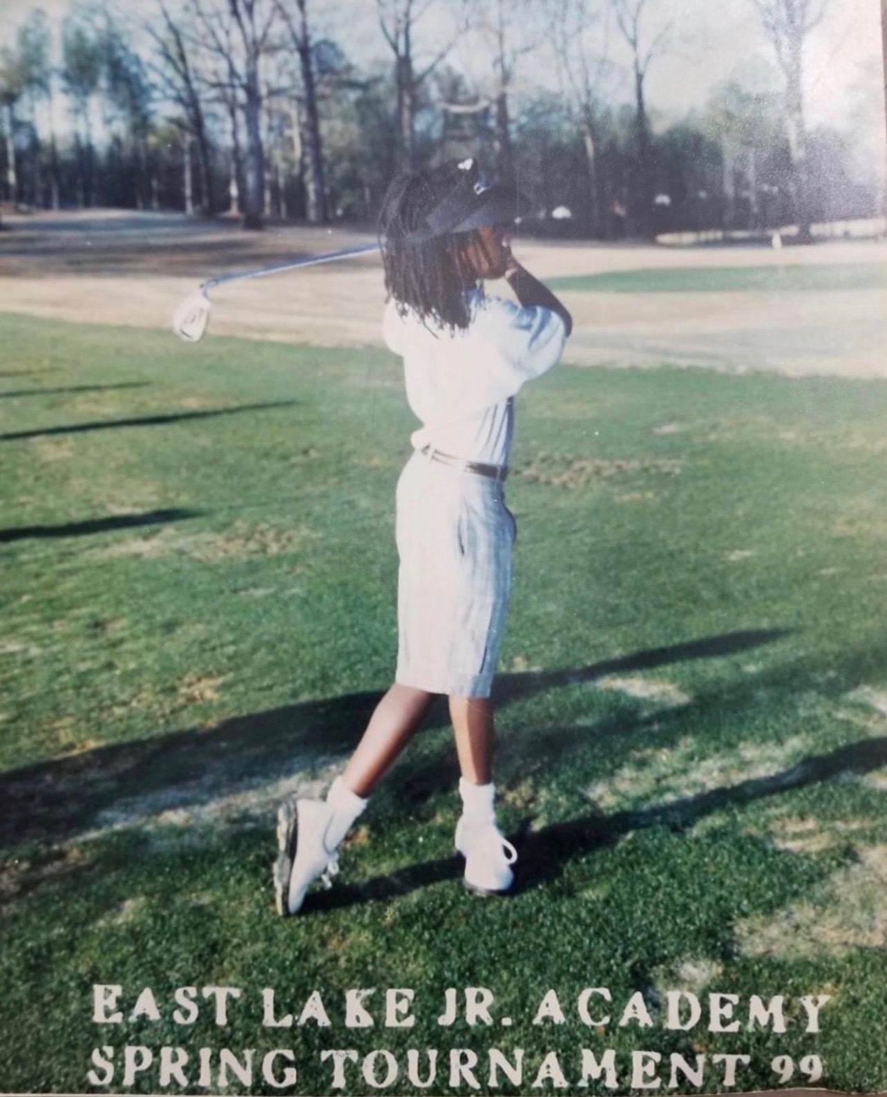 Olajuwon Ajanaku as a junior golfer mid-swing